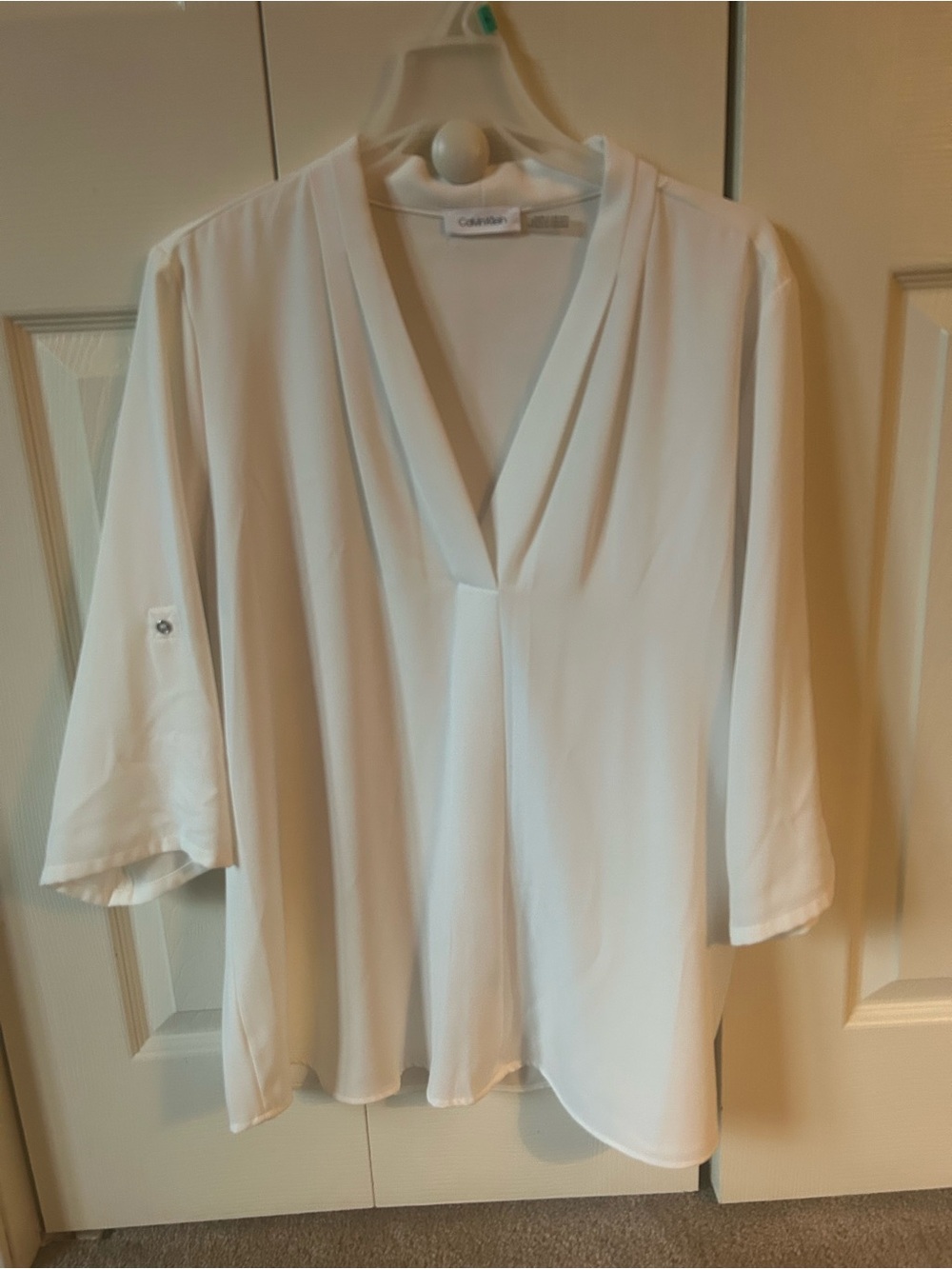 Calvin Klein Off-White V-Neck Flowing Blouse with roll tab sleeves